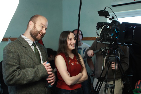 David Curtis (Gabriel Cushing) and Vicki Glover (Melanie Lancley) acting (up) off camera whilst filming the Carnival of Sorrows. Also pictured, Barry Davis (boom) and Felek Werpachowski (camera and DP).