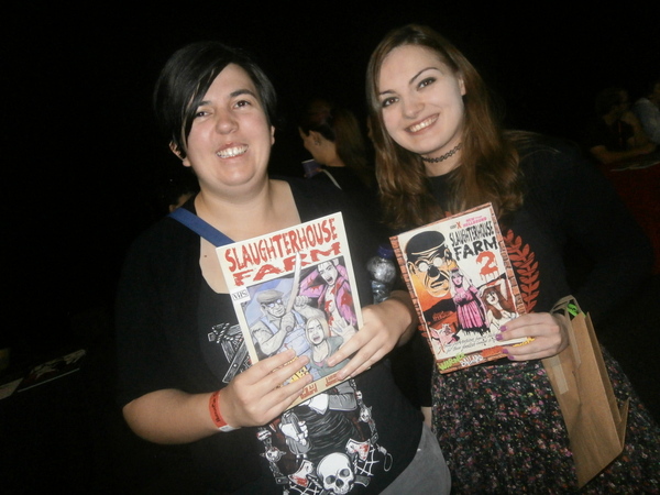 Fans with copies of Slaugherhouse Farm comic